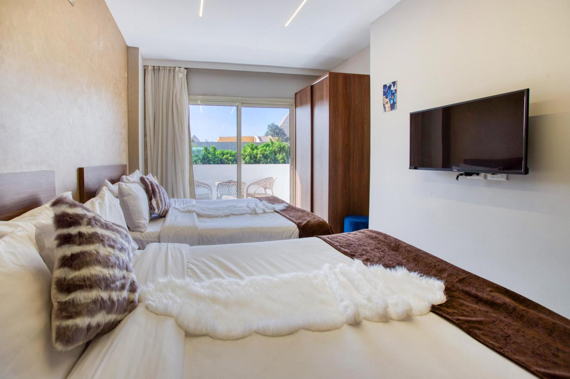 Tree Lounge Pyramids View Inn , Sphinx Giza Kafrat al Jabal Exterior photo